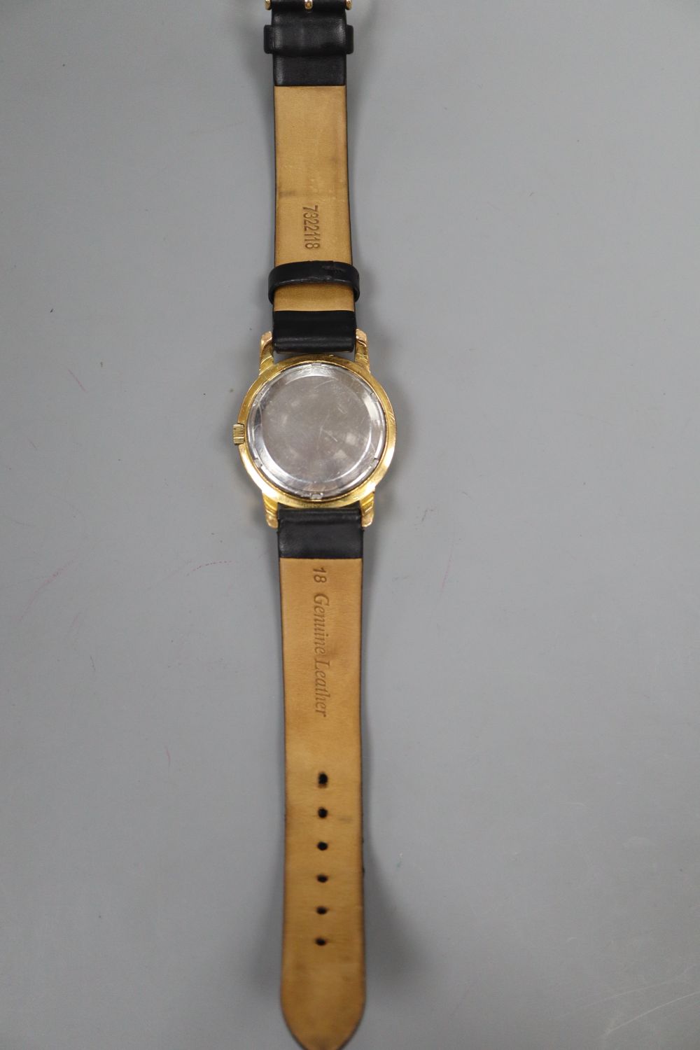 A 1960s? steel and gold plated Heuer black dial automatic wrist watch, on later associated strap.